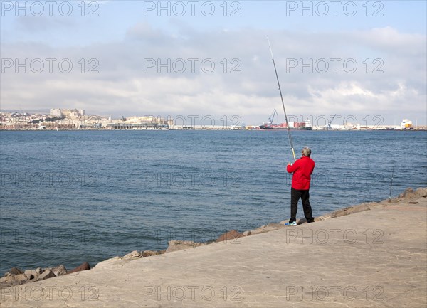 Man sea fishing Melilla autonomous city state Spanish territory in north Africa, Spain, Europe