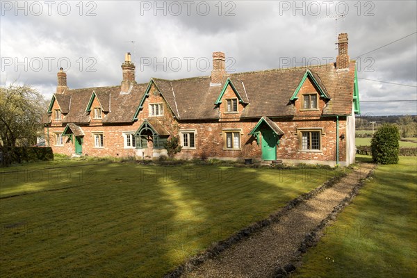 Traditional row of rural cottages in small terrace, Compton Bassett, Wiltshire, England, UK