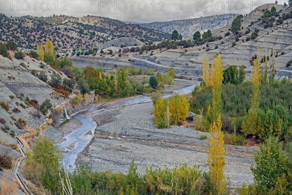 Stream and desolate dwelling in the High Atlas Mountains, Midelt Province, Draa-Tafilalet Region, Morocco, Africa