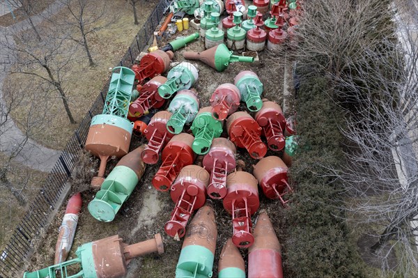Detroit, Michigan, Navigational buoys stored at the U.S. Coast Guard station. The buoys mark the shipping channel from Saginaw Bay in Lake Huron through the St. Clair River, Lake St. Clair, and the Detroit River to Lake Erie. Many buoys are removed from the water and stored at the Coast Guard station for the winter