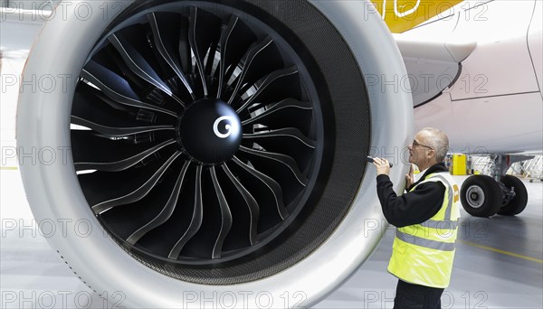 Olaf Gross, Licence Engineer at easyJet, checks the engine of an Airbus A320 Neo in front of the opening of the new easyJet maintenance hangar at Berlin Brandenburg Airport, BER. The entire European easyJet fleet is maintained at the Schoenefeld site