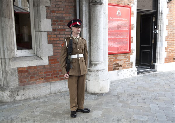 Soldier on duty outside the Convent building official residence of the Governor, Gibraltar, British overseas territory in southern Europe, Europe