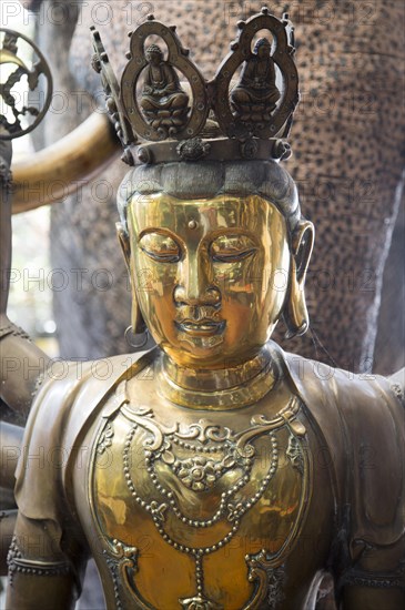 Brass Buddha figure, Gangaramaya Buddhist Temple, Colombo, Sri Lanka, Asia