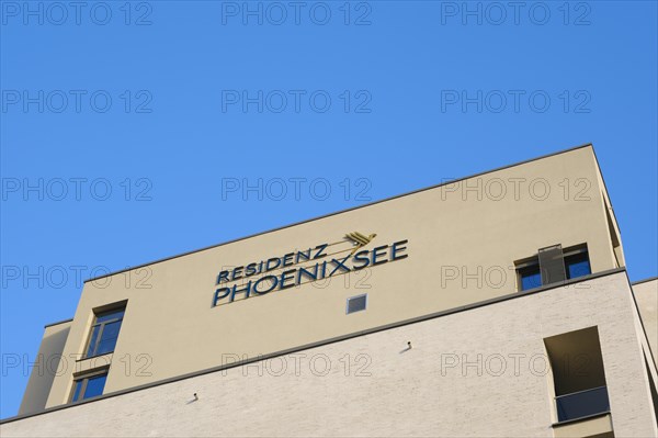 Building with lettering and logo Residenz Phoenixsee, Hoerde, Dortmund, Ruhr area, Westphalia, North Rhine-Westphalia, Germany, Europe