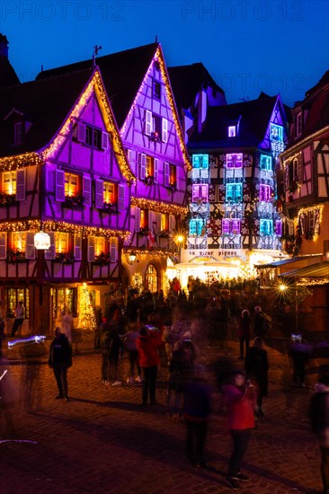 Historic houses with Christmas lights, Christmas decoration, Christmas market, half-timbered house, historic town, people, blue hour, Der Fischerstaden, Colmar, Alsace, France, Europe