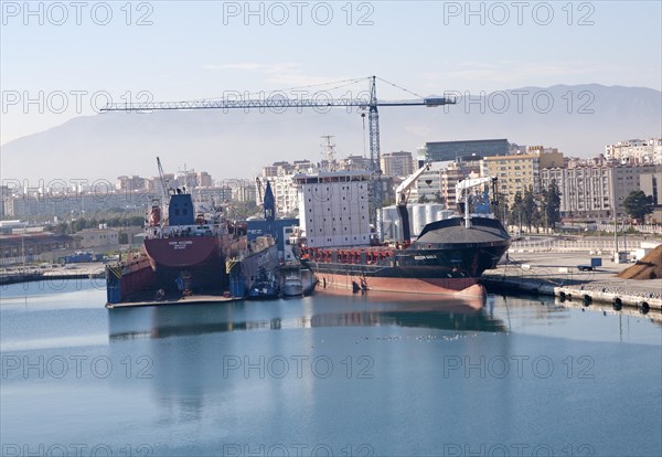 Cargo ships in the port of Malaga, Spain, Europe