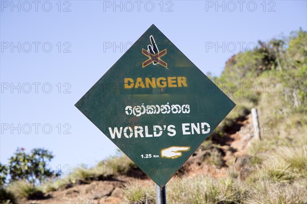 Sign warning of danger at World's End cliff at Horton Plains national park, Sri Lanka, Asia