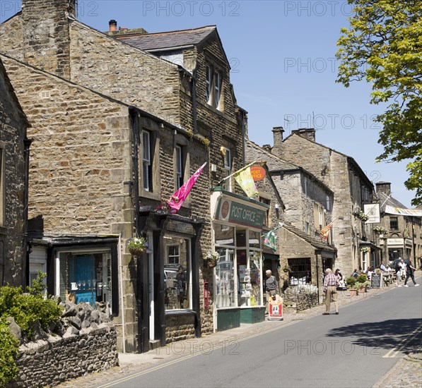 Busy main street in Grassington, Yorkshire Dales national park, England, UK