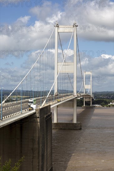 The old 1960s Severn bridge crossing between Aust and Beachley, Gloucestershire, England, UK looking west