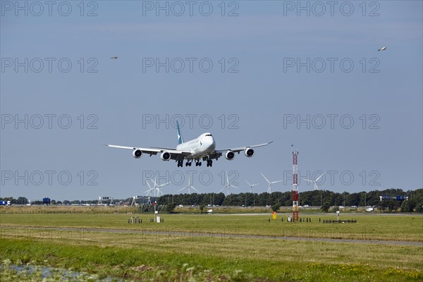 Cathay Pacific Cargo Boeing 747-867F with registration B-LJI lands on the Polderbaan, Amsterdam Schiphol Airport in Vijfhuizen, municipality of Haarlemmermeer, Noord-Holland, Netherlands