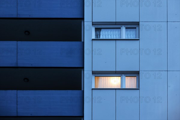 Illuminated room in a tower block in Gropiusstadt. The rise in rents in German cities has increased again in the past year, Berlin, 16.01.2023