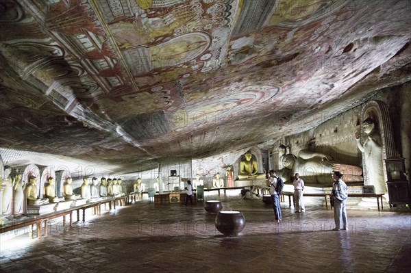 Buddha figures inside Dambulla cave Buddhist temple complex, Sri Lanka, Asia