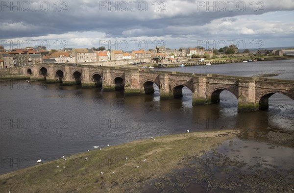 Historic stone bridge crossing River Tweed, Berwick-upon-Tweed, Northumberland, England, UK