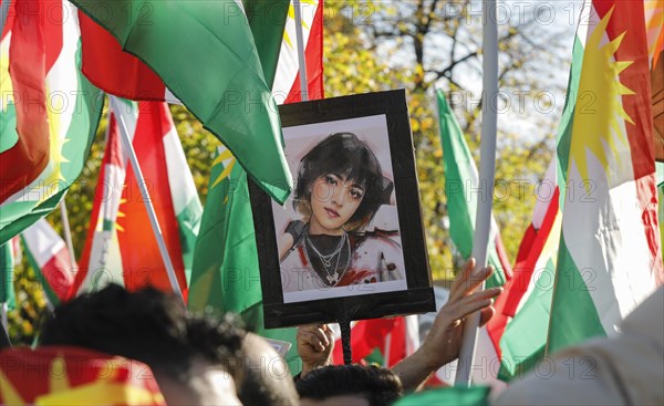 A picture of Mahsa Amini is shown at a demonstration in Berlin. Thousands of Iranians protest in support of the protests in Iran. The demonstration was called by the Woman Life Freedom Collective, Berlin, 22 October 2022