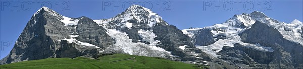 Panoramic view from the Kleine Scheidegg over the mountains Eiger (3970 m), Moench (4104 m) and Jungfrau (4158 m) in the Bernese Alps, Switzerland, Europe