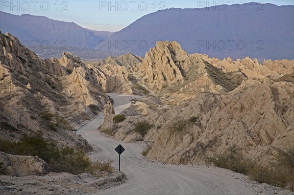 Winding dirt road though the Quebrada de las Flechas, Salta Province, Argentina, South America