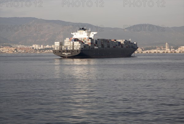 Container ship at moorings off Gibraltar, Port of Algeciras, Spain, Europe