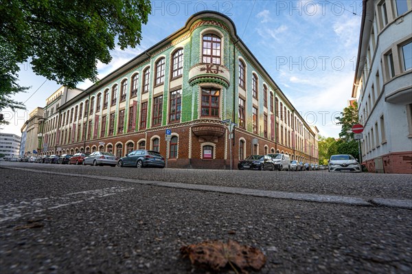 Wide-angle perspective of a historic building with green tiled facades, Kollmar & Jourdan House, Pforzheim, Germany, Europe