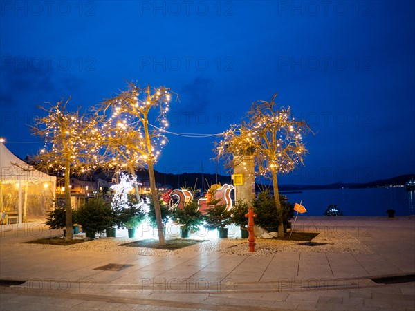 Blue hour, Christmas decoration at the harbour, harbour of Mali Losinj, island of Losinj, Kvarner Gulf Bay, Adriatic Sea, Croatia, Europe