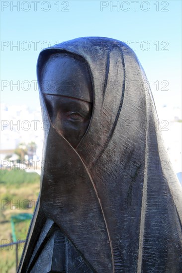 Statue close up of traditional clothes worn by women in Vejer de la Frontera, Cadiz province, Spain, Europe