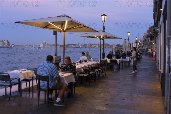 Restaurant on the waterfront of the Guidecca Canal, Dorsoduro district, Venice, Veneto, Italy, Europe