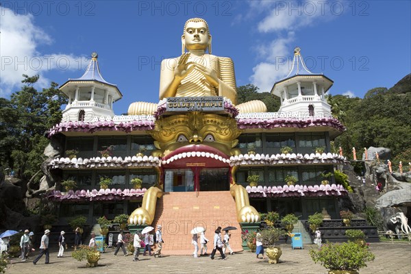 Giant Golden Buddha statue at Dambulla cave temple complex, Sri Lanka, Asia