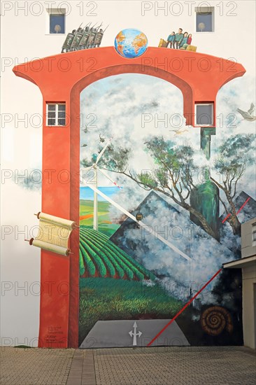 Mural Tor zur Welt by Klaus Klinger 1999, street art, graffiti, scroll, earth globe, figures, windmill, environment, wine-growing area, street, arrow, direction, entrance, look through, wall, building, Antoniterstrasse, Alzey, Rhine-Hesse region, Rhineland-Palatinate, Germany, Europe