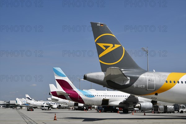 Overview Condor, Eurowings, Iberia, Finnair, KLM and Air Lingus aircraft at handling position at Terminal 1 with control tower, Munich Airport, Upper Bavaria, Bavaria, Germany, Europe