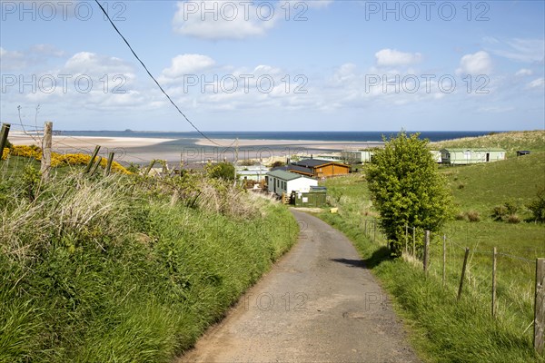 Tourist accommodation at Budle Bay, Northumberland coast, England, UK