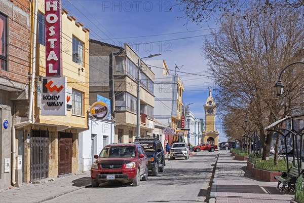 Main street and yellow clock tower in the city Uyuni, Antonio Quijarro Province, Potosi Department, Bolivia, South America