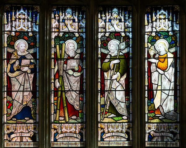 Stained glass window of four saints c 1906, church of Saint Nicholas, Biddestone, Wiltshire, England, UK