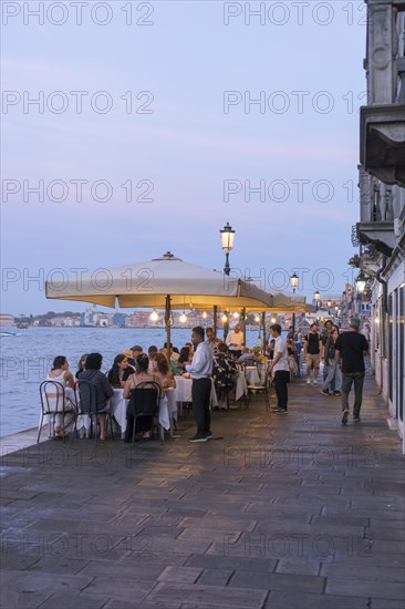 Restaurant on the waterfront of the Guidecca Canal, Dorsoduro district, Venice, Veneto, Italy, Europe