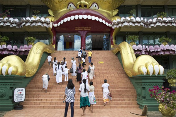 People at Dambulla Buddhist museum complex, Sri Lanka, Asia