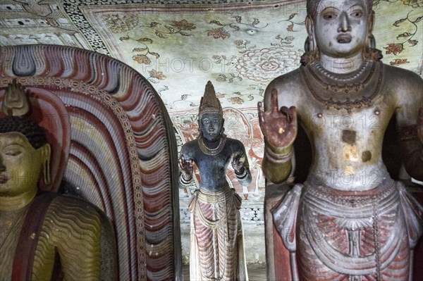 Buddha figures inside Dambulla cave Buddhist temple complex, Sri Lanka, Asia