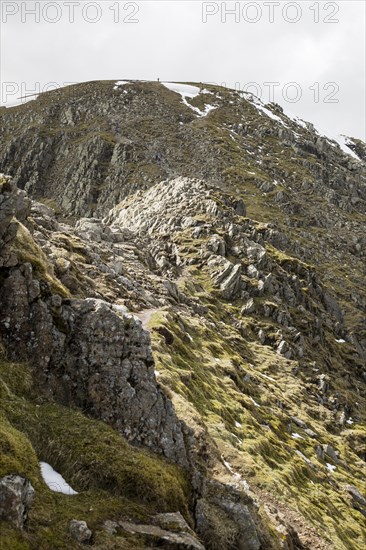 Striding Edge arete and Helvellyn mountain peak, Lake District, Cumbria, England, UK