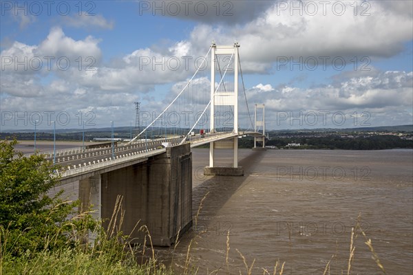 The old 1960s Severn bridge crossing between Aust and Beachley, Gloucestershire, England, UK looking west