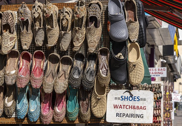 Shoe shops and craftsmen in the Al Fahidi neighbourhood, Dubai, United Arab Emirates, Asia