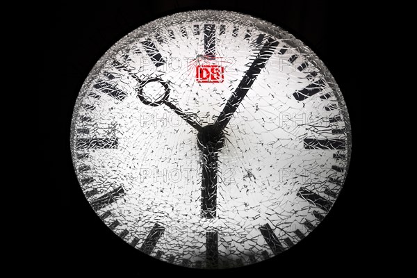 Shattered glass on a railway station clock at night, detail, symbolic photo, Witten, North Rhine-Westphalia, Germany, Europe