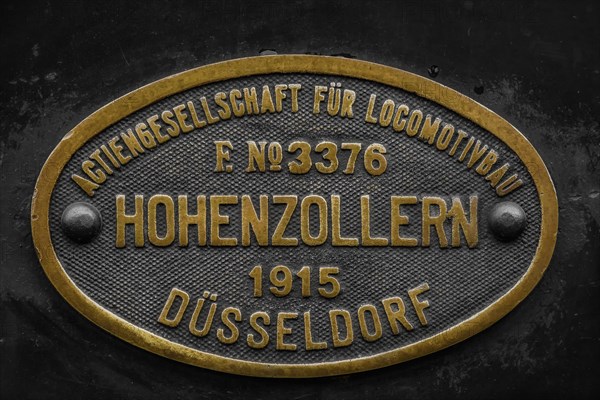 Brass factory plate of the 'Actiengesellschaft fuer Locomotivbau Hohenzollern' from 1915, Dahlhausen railway depot, Lost Place, Dahlhausen, Bochum, North Rhine-Westphalia, Germany, Europe