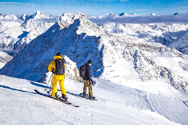 Skiers and snowboarders on the black ski route no. 41 from the Schwarze Schneid to the Seiterkarbahn, Tiefenbachferner, glacier ski area, Soelden, Oetztal, Tyrol