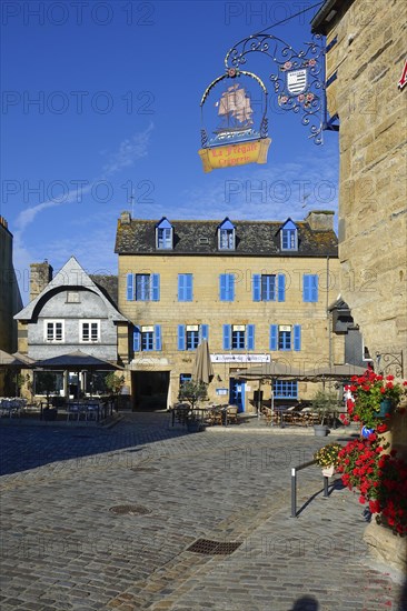 Rue du General de Gaulle in the old town centre of Le Faou with slate-roofed granite houses from the 16th century, Finistere department, Brittany region, France, Europe