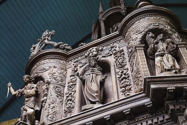 Renaissance-style carved canopy of the baptismal font, Enclos Paroissial enclosed parish of Guimiliau, Finistere Penn ar Bed department, Brittany Breizh region, France, Europe