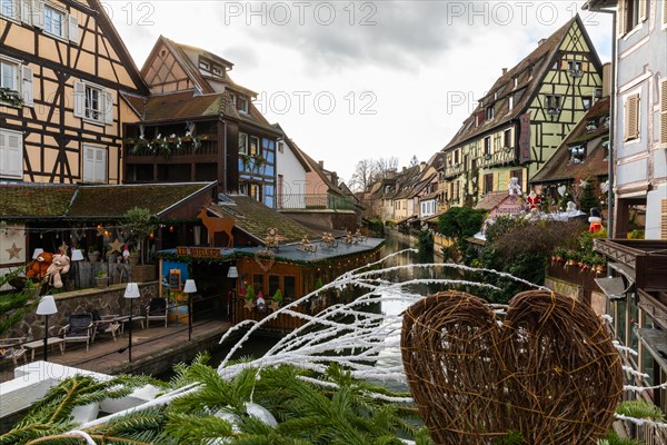 Historic houses with Quai de Poissonnerie, Little Venice, Petite Venise, Christmas decoration, Christmas market, historic town, Der Fischerstaden, Colmar, Alsace, France, Europe