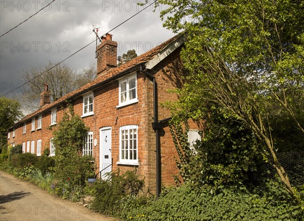 Red brick cottages in Shottisham, Suffolk, England, UK