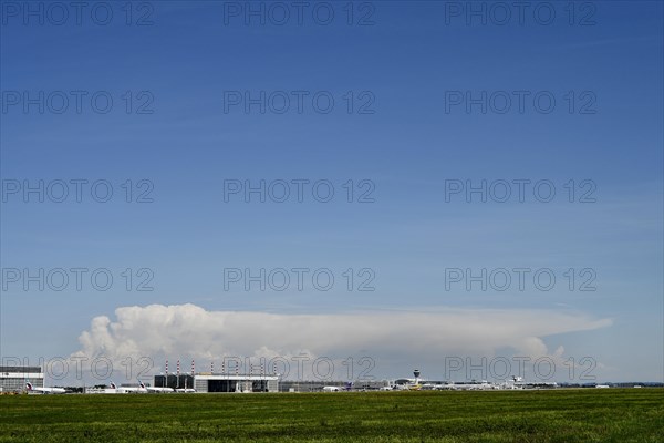 Overview airport with thundercloud in storm front in the background, Munich Airport, Upper Bavaria, Bavaria, Germany, Europe