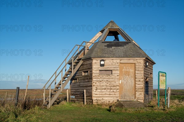 Bird hide at the nature reserve Verdronken Land van Saeftinghe, salt marsh of the Western Scheldt estuary on the border of the Netherlands and Belgium