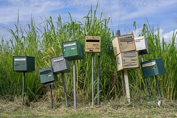 Row of individual mail boxes, letter boxes, mailboxes, letterboxes, postboxes of residents on the French island of Martinique in the Caribbean