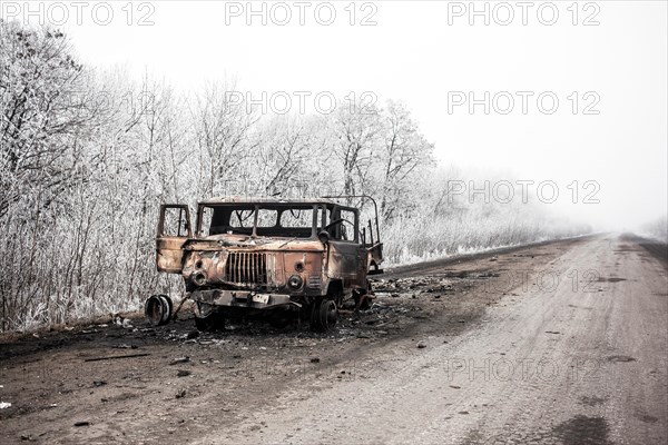 Destroyed lorry, wintry landscape, front near Debaltseve, Donbas, Ukraine, Europe