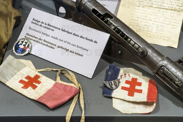 FFI armbands and badges of the Forces francaises de l'interieur, French Resistance interior force and WW2 stengun, sten gun, British submachine gun