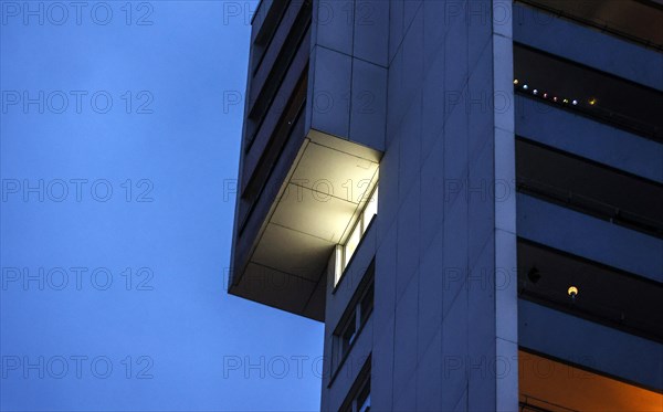 Illuminated flat in a tower block in Gropiusstadt. The rise in rents in German cities has increased again in the past year, Berlin, 16.01.2023